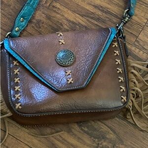 RED DIRT HAT CO. BROWN & TURQUOISE FRINGE CONCHO CROSSBODY BAG
